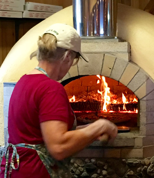 Making pizza in the brick oven | Hilary Nangle